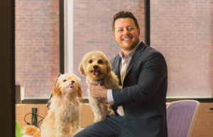 Cuddle Clones co-founder Adam Greene, his dog Teddy, and Teddy's clone.