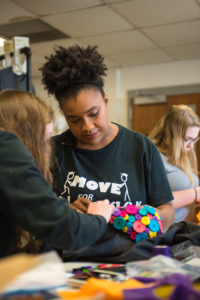 Lewis works on her designs in UofL's studio. 