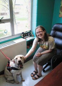 Jake the therapy dog with Alarah Gillum.