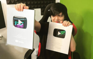 VG posing with YouTube Silver Play buttons.