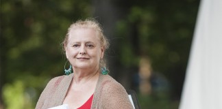 UofL theatre arts professor Rinda Frye spoke before the "red out" July 23 performance of "The Tempest" at Shakespeare in Central Park. The 2015 cast and crew is made up of many UofL students, alumni and staff members.