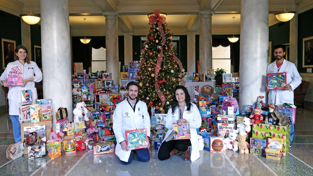 Residents and fellows in the UofL School of Medicine collected 500 toys for Toys for Tots. Faculty, staff and students added another 70 for a total of 570.