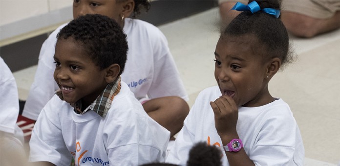 Children react during a lesson as part of the PNC Grow Up Great Fellows.