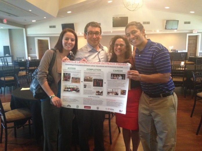 Pictured performing outreach at a Latino success program are, l to r: student and graduate instructor Sara Alvarez; assistant professor Steven Alvarez; assistant director of the Cultural Center Sarah Nunez; and student Luis Arduz.