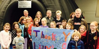 Students at Bloom Elementary school express their appreciation for a fundraiser that brought the Owsley Brown II Portable Planetarium to their school in 2014.
