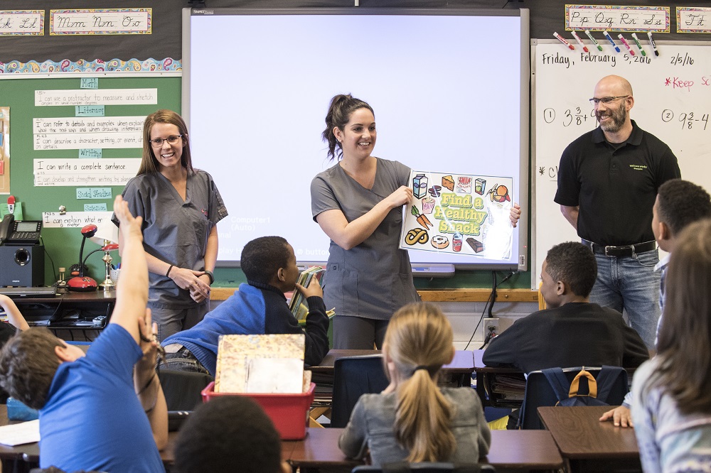 UofL students and faculty perform dental screenings in JCPS schools