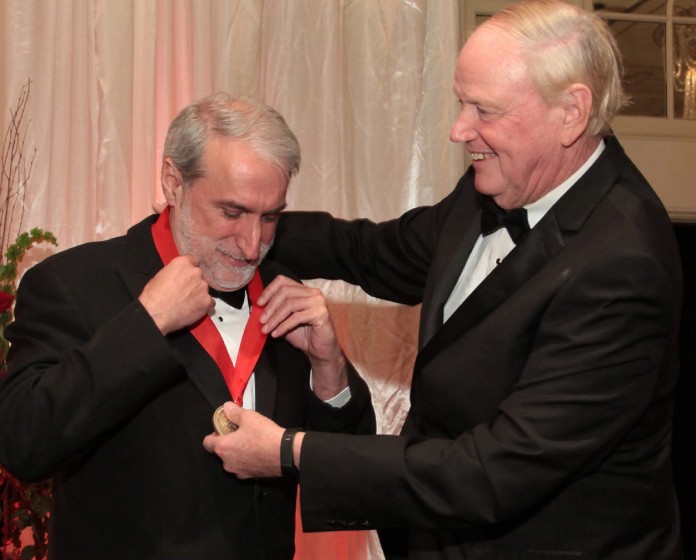 conn-prize Dr. James Ramsey, UofL President, conferred the 2015 Leigh Ann Conn Prize for Renewable Energy to Dr. Daniel Nocera, left, the Patterson Rookwood Professor of Energy at Harvard University, during an award ceremony