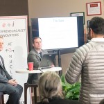 David Durik and Phil Hawkins, founders of Indatus Corp., listen to a question from the audience at the Entrepreneurs Meet Innovators (e+i) program Dec. 3.