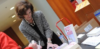 An author signs her book at the 2015 festival.