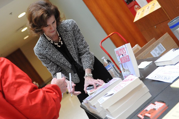 An author signs her book at the 2015 festival.