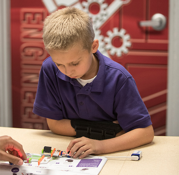 A West End student in the new maker space provided by the Speed School.