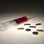 Syringe and pills
