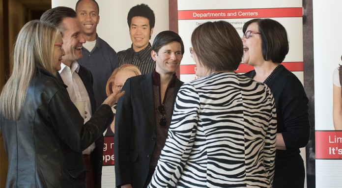 Participants in a news conference to announce UofL's new Youth Violence Prevention Research Center chatted Nov. 20.