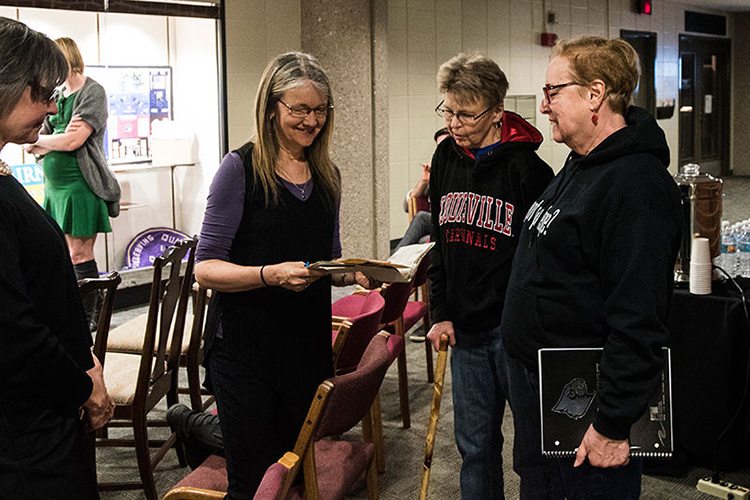 Prof. Cate Fosl led a “History Harvest” at UofL’s Ekstrom Library to collect memorabilia and oral histories from LGBTQ Kentuckians in an effort to understand more about 20th century life in the state.