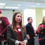 UofL student Elizabeth Kloenne explains her undergraduate research project to the UofL community.