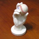 Custom-made 3D plaster cast of hand holding a baseball.