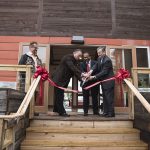 A ribbon cutting ceremony celebrated the Conn Center's solar-powered Phoenix House. From left is Andrew Marsh, asst. director of the Conn Center, Mark McGinley, Speed professor, Mahendra Sunkara, director of the Conn Center, and John Usher, acting dean of the Speed School.