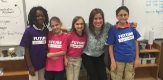 UofL's College of Business continued its yearlong outreach project at the West Louisville school with a “Professional Signing Day."