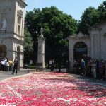 The rose petal-covered entrance to Cave Hill Cemetery.