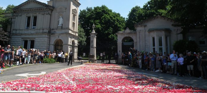 The rose petal-covered entrance to Cave Hill Cemetery.