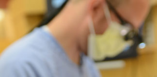 Dental student treats a patient at the School of Dentistry.