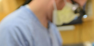 Dental student treats a patient at the School of Dentistry.