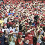 Convocation includes the symbolic issuing of a Cardinals baseball cap, which the freshmen are encouraged to exchange for a graduation cap in four years.