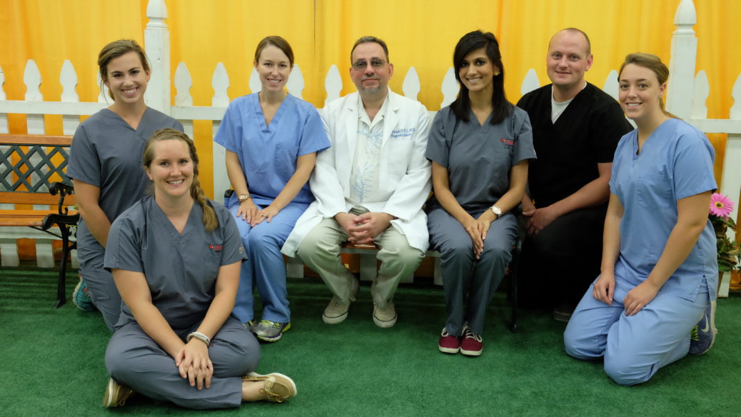 Dental students and faculty on hand to complete head and neck assessments at the 2015 Kentucky State Fair.