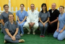 Dental students and faculty on hand to complete head and neck assessments at the 2015 Kentucky State Fair.