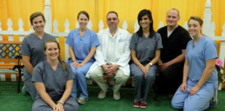 Dental students and faculty on hand to complete head and neck assessments at the 2015 Kentucky State Fair.