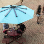 The Powersol table and umbrella will permanently reside in the courtyard at Bettie Johnson Hall.