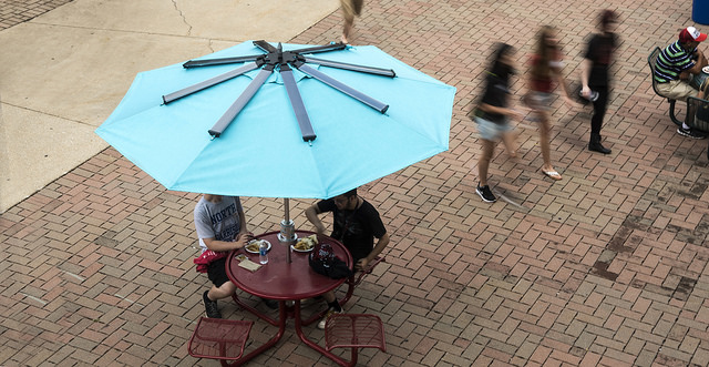 The Powersol table and umbrella will permanently reside in the courtyard at Bettie Johnson Hall.