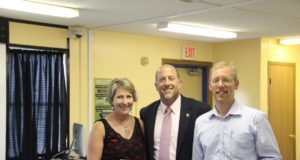 Williams and Hill with Carroll County School District Superintendent Bill Hogan.