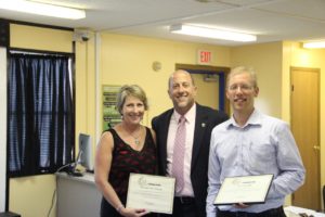 Williams and Hill with Carroll County School District Superintendent Bill Hogan.