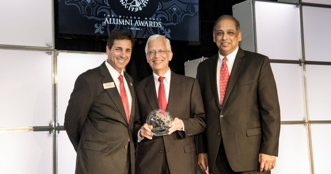 Ernie Allen, center, is this year's Alumnus of the Year. He is a 1968 Arts & Sciences graduate, and a 1972 graduate of the Brandeis School of Law. Allen is a founder of the National Center for Missing & Exploited Children and served as chairman, then president and CEO for 28 years.