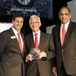 Ernie Allen, center, is this year's Alumnus of the Year. He is a 1968 Arts & Sciences graduate, and a 1972 graduate of the Brandeis School of Law. Allen is a founder of the National Center for Missing & Exploited Children and served as chairman, then president and CEO for 28 years.