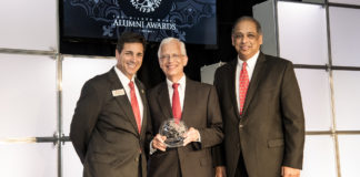 Ernie Allen, center, is this year's Alumnus of the Year. He is a 1968 Arts & Sciences graduate, and a 1972 graduate of the Brandeis School of Law. Allen is a founder of the National Center for Missing & Exploited Children and served as chairman, then president and CEO for 28 years.