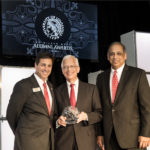 Ernie Allen, center, is this year's Alumnus of the Year. He is a 1968 Arts & Sciences graduate, and a 1972 graduate of the Brandeis School of Law. Allen is a founder of the National Center for Missing & Exploited Children and served as chairman, then president and CEO for 28 years.