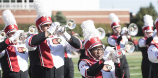 The Cardinal Marching Band shown in a pre-pandemic performance.