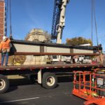 Workers loaded a large section of the confederate monument on a truck during deconstruction of the monument Sunday, nov. 20. The monument will be reassembled in Brandenburg, where it will join other monuments in a historical display.