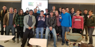 Professor Sundar Atre (front, in blazer), Endowed Chair of Manufacturing and Materials, and students participating in the new UofL 3-D Printing Business Incubator.