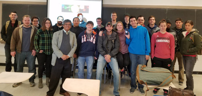 Professor Sundar Atre (front, in blazer), Endowed Chair of Manufacturing and Materials, and students participating in the new UofL 3-D Printing Business Incubator.