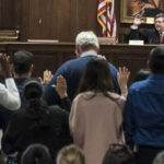 Twenty-nine people became U.S. citizens during a Nov. 18 naturalization ceremony in the Brandeis School of Law’s Allen Courtroom.