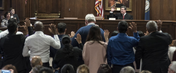 Twenty-nine people became U.S. citizens during a Nov. 18 naturalization ceremony in the Brandeis School of Law’s Allen Courtroom.