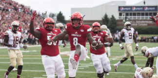 Lamar Jackson, No. 8, is the first player from UofL to win the Heisman Trophy.