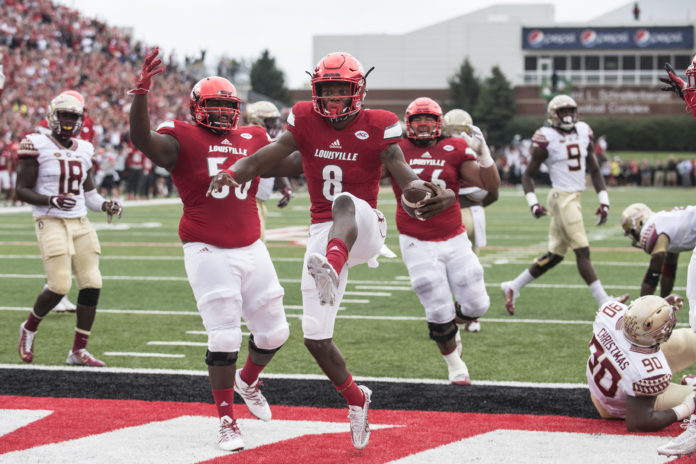 Lamar Jackson, No. 8, is the first player from UofL to win the Heisman Trophy.