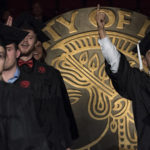 Nearly 1,000 graduates took part in the Dec. 15 commencement ceremony at the KFC Yum! Center.