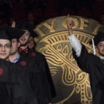 Nearly 1,000 graduates took part in the Dec. 15 commencement ceremony at the KFC Yum! Center.