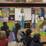 Dental hygiene students teach oral health education.