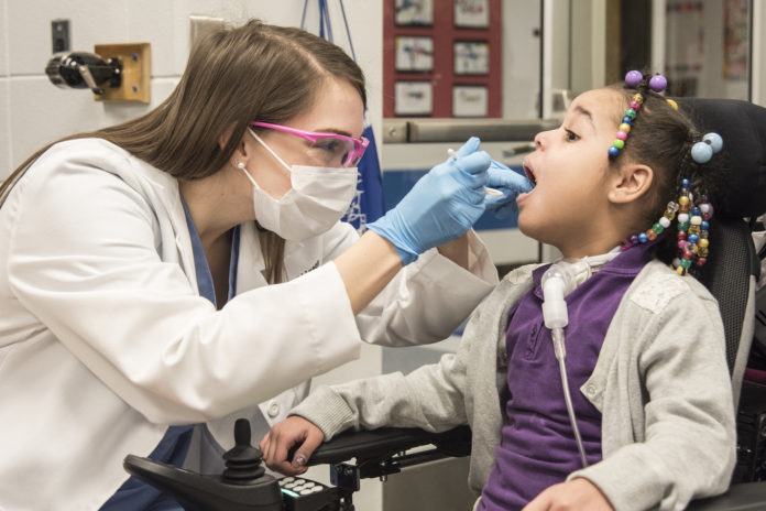 UofL's School of Dentistry has provided free dental care to local children on the first Friday in February (national Give Kids a Smile day) since 2002